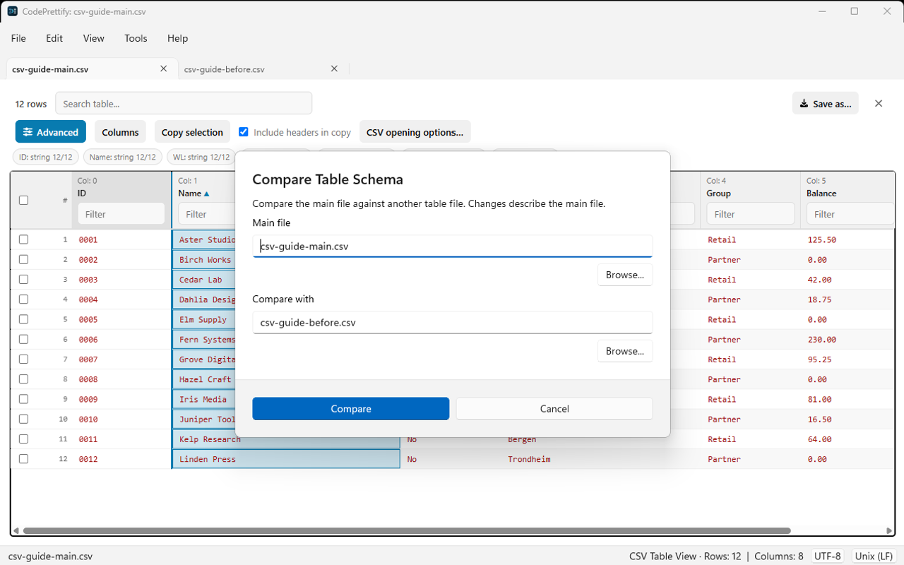Windows Compare Table Schema dialog identifying Main file and Compare with using the two CSV samples